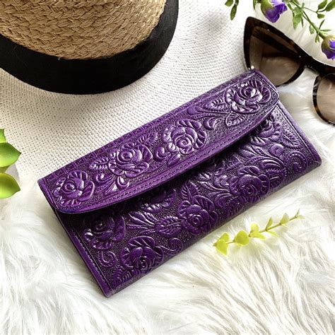 purple designer wallets for women.